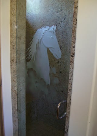 Shower Door showcasing a Frosted Glass Western Design with Sandblast Etched Glass Art by Sans Soucie Horse Bust Design