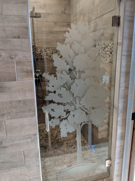Shower Door with a Frosted Glass Maple Trees Design for Semi-Private by Sans Soucie Art Glass