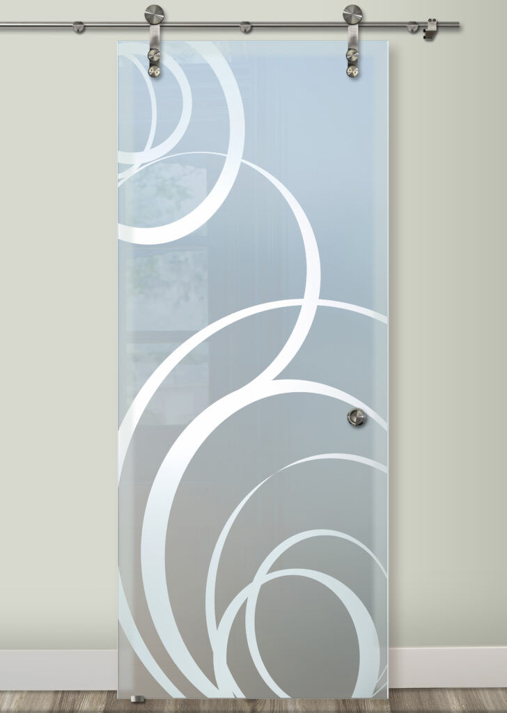 Frosted glass sliding barn door with modern circular motion design and stainless steel rail hardware