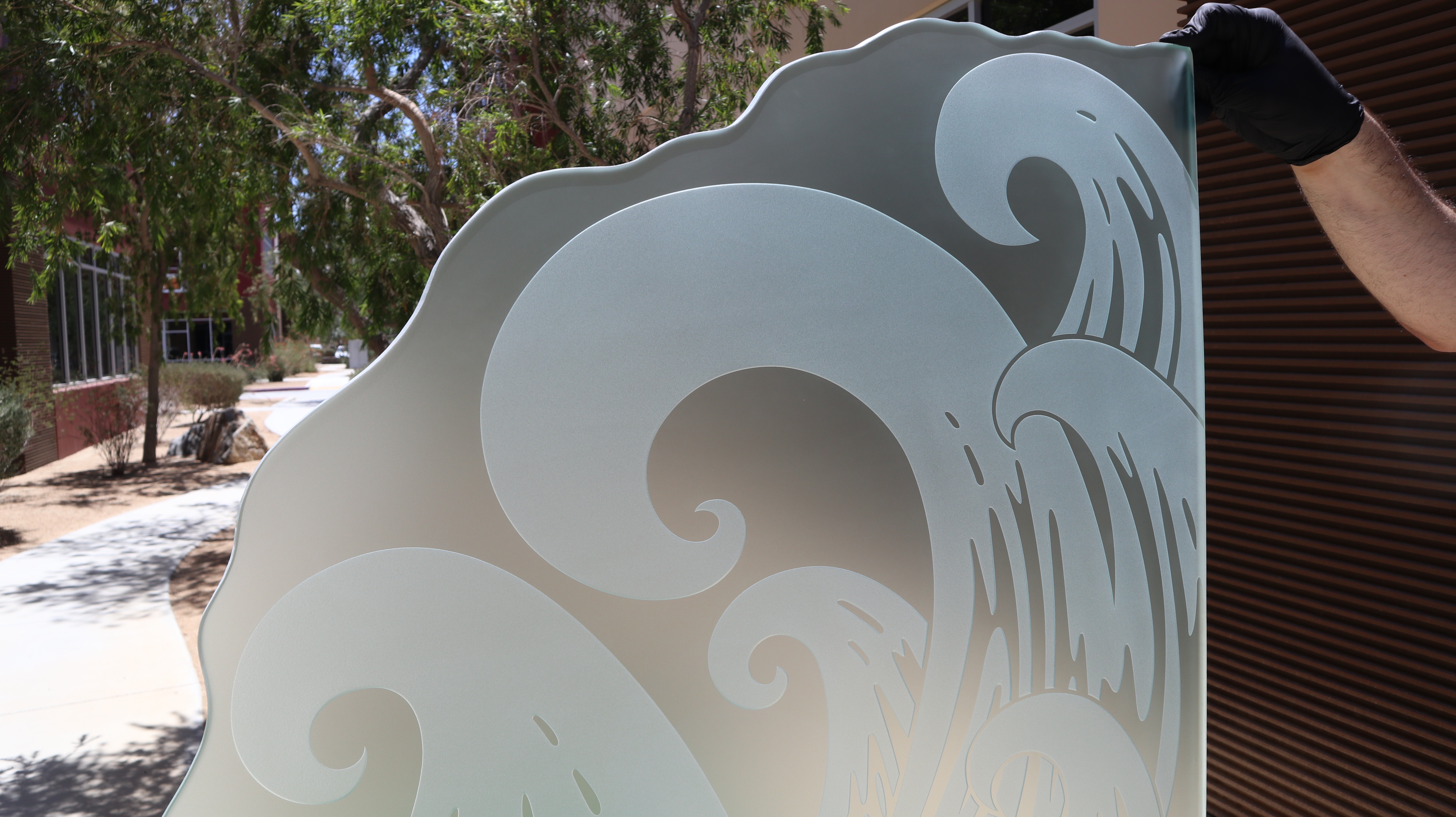 Sans Soucie’s Newport Waves shower glass panel design in a 3D Flat Carved Private effect.