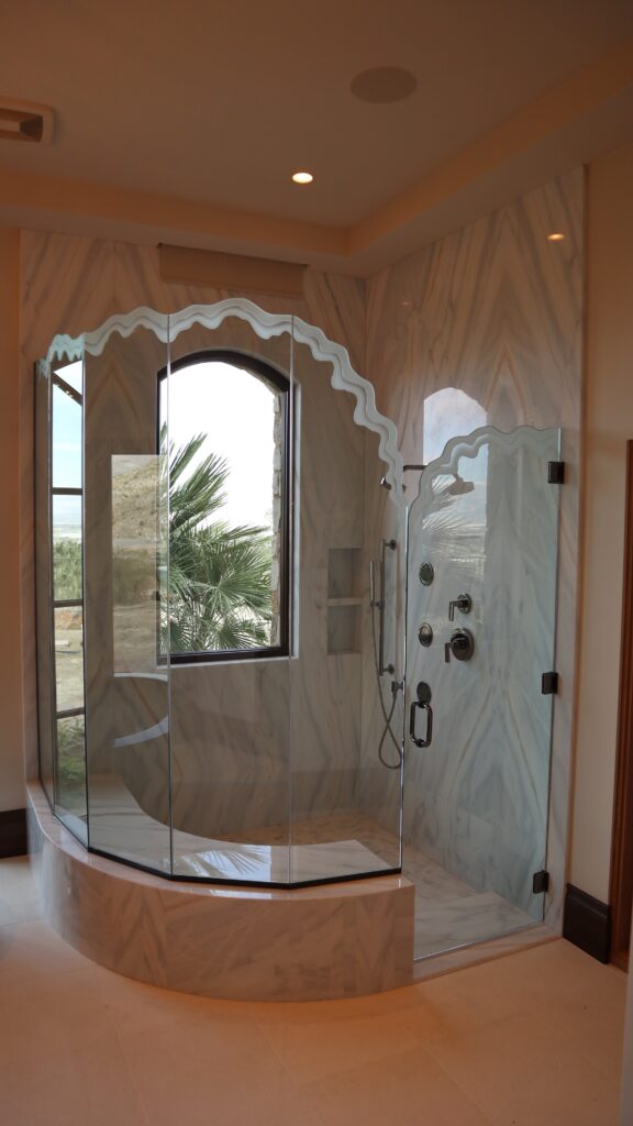 Glass shower enclosure