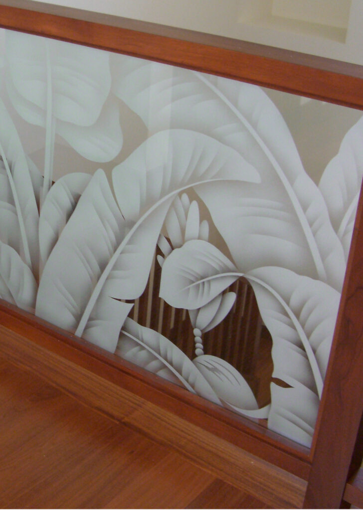 Partition glass with banana leaves-inspired design