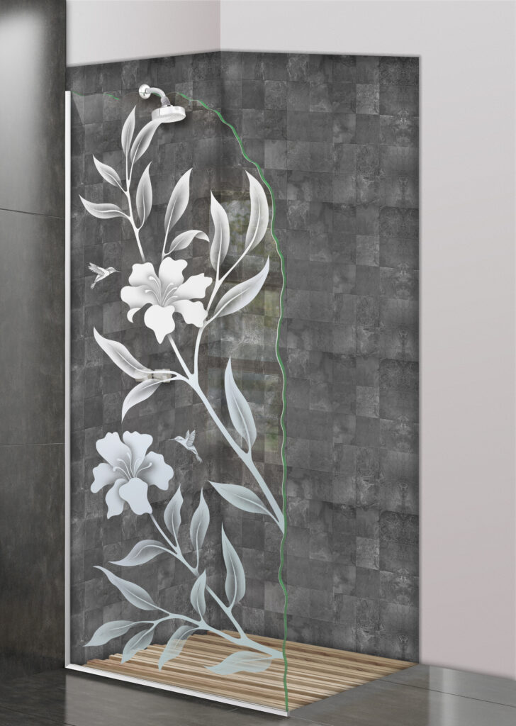 Glass shower divider with frosted hibiscus flowers and hummingbirds in a modern gray shower.
