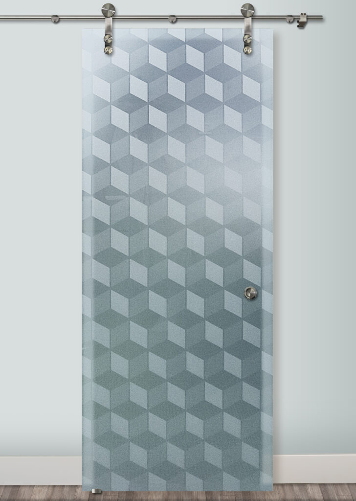 A modern glass barn door crafted by skilled artisans, perfect for modern industrial interior designs.