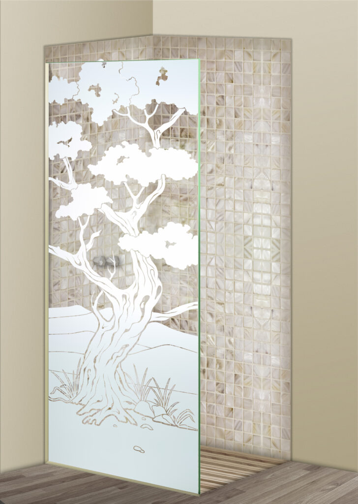 Glass shower divider with frosted bonsai tree design in a neutral mosaic tile shower.