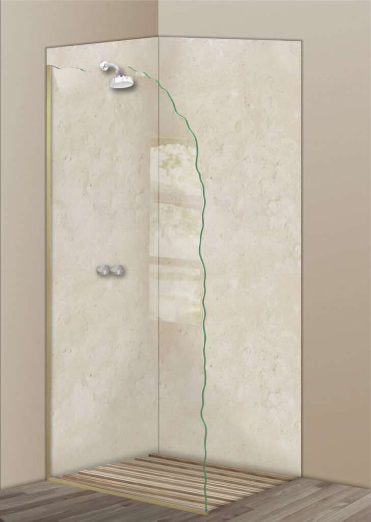Clear frameless glass shower divider with a wavy edge in a walk-in shower with beige stone walls and wood-look flooring.
