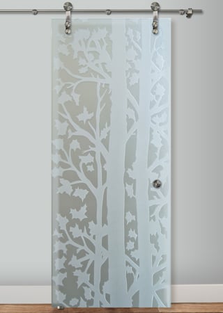 Glass Barn Door showcasing a Frosted Glass Tree Design with Sandblast Etched Glass Art by Sans Soucie Forest Trees Design