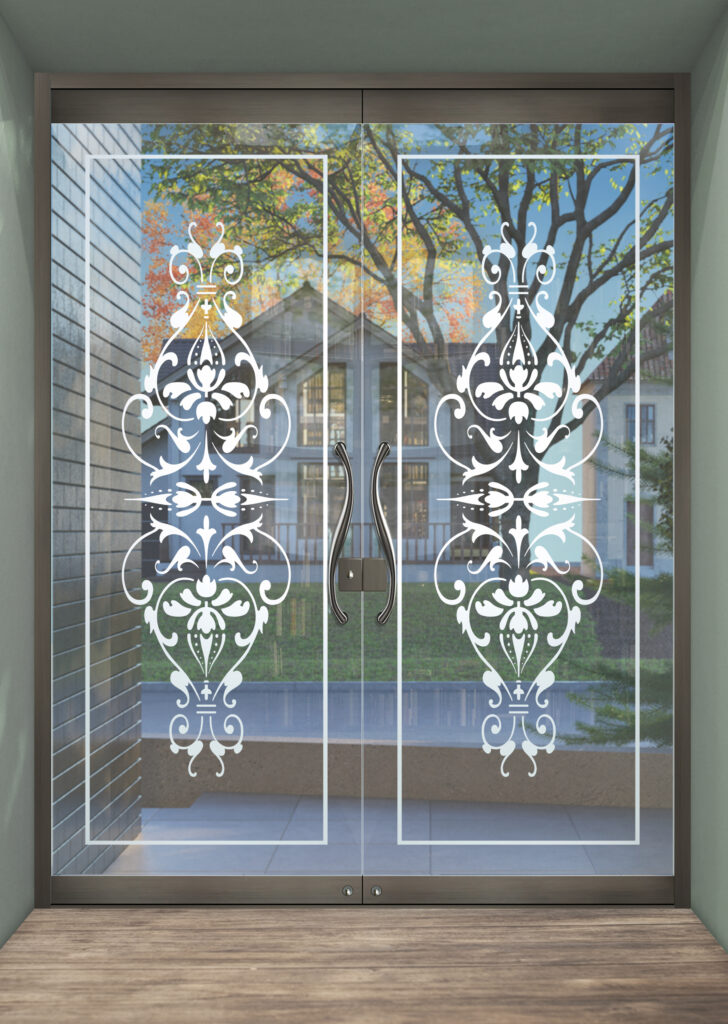 Frameless glass entry doors with etched artwork for commercial areas