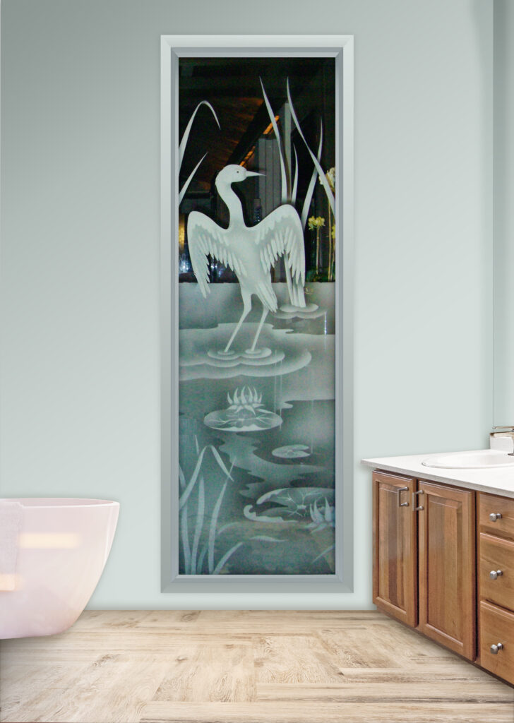 Etched glass wildlife scene window with crane standing in water, semi-private glass design allowing light while softening visibility