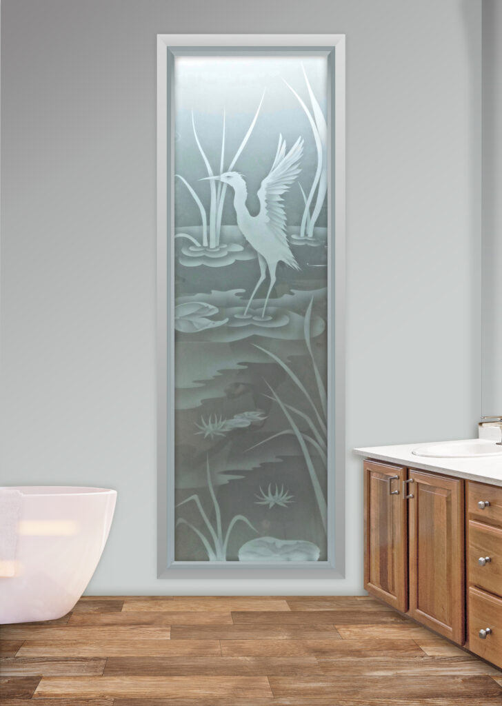 Etched glass wildlife scene window with crane standing in water, frosted glass design providing privacy and soft light diffusion