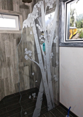 Shower Partition showcasing a Frosted Glass Tree Design with Sandblast Etched Glass Art by Sans Soucie Aspen Trees Design