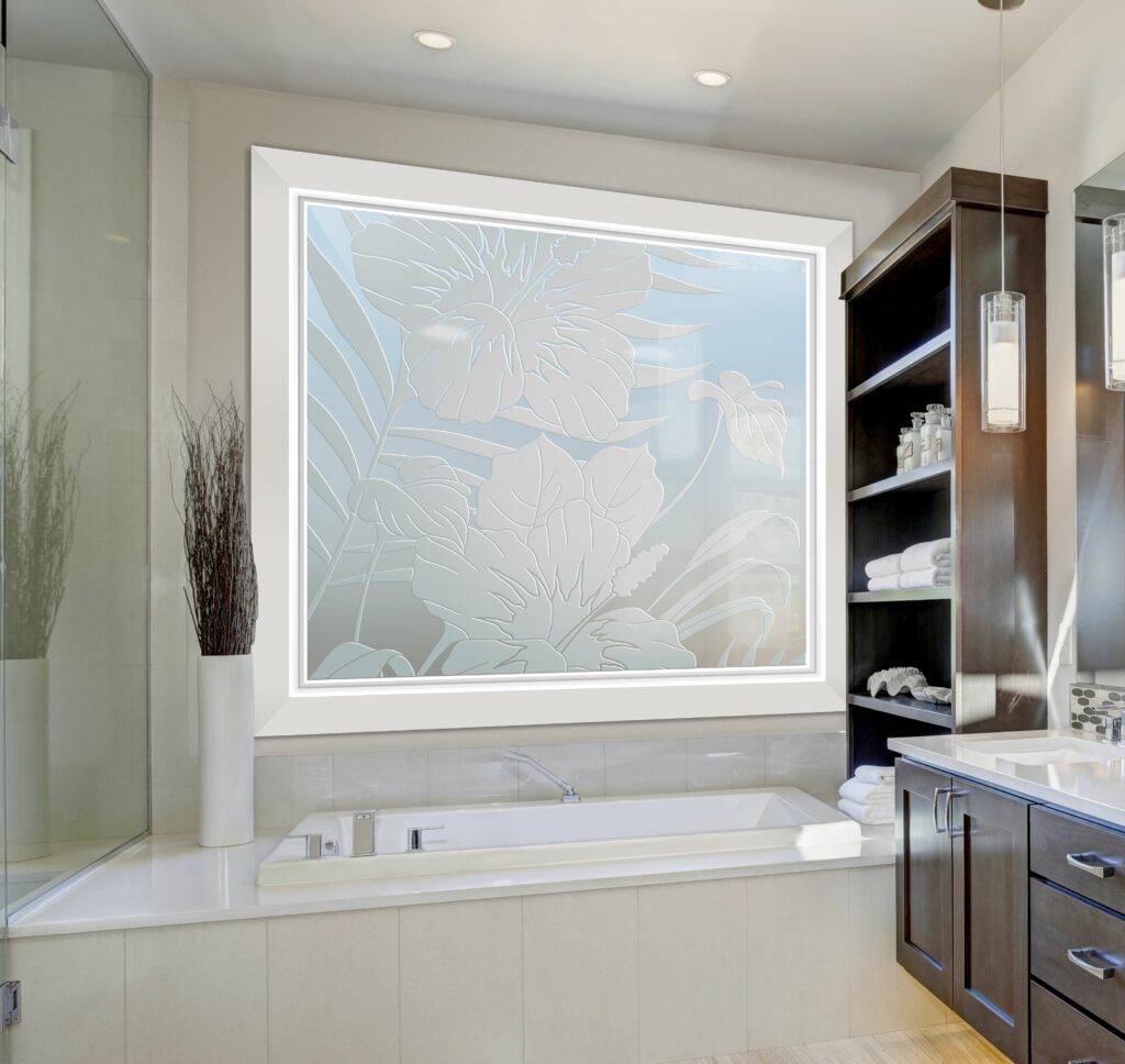 Frosted glass bathroom window featuring large floral hibiscus design