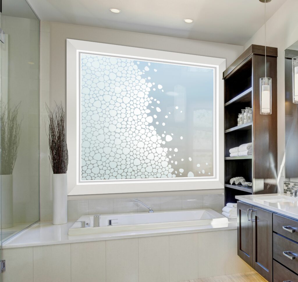 Sans Soucie frosted glass window installed in a small bathroom to maximize light and protect privacy.