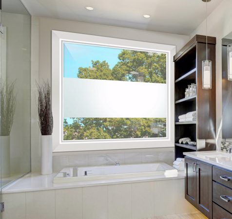 Window showcasing a Frosted Glass Geometric Design with Sandblast Etched Glass Art by Sans Soucie Solid Band Design