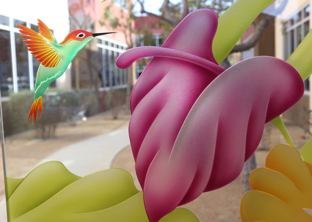Close-up of vibrant tropical hummingbird and hibiscus on 3D enhanced frosted glass with luminous hand-painted colors.