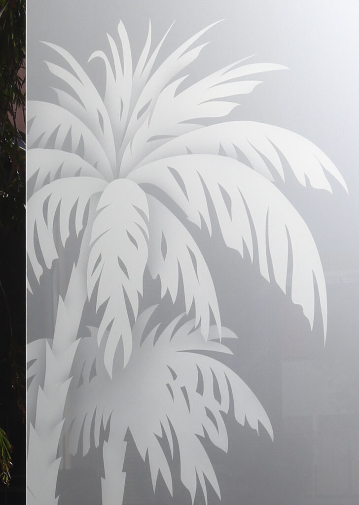 Close-up of etched frosted glass Palm Sunset, perfectly suited for a black front door with glass that offers artistic style and privacy.