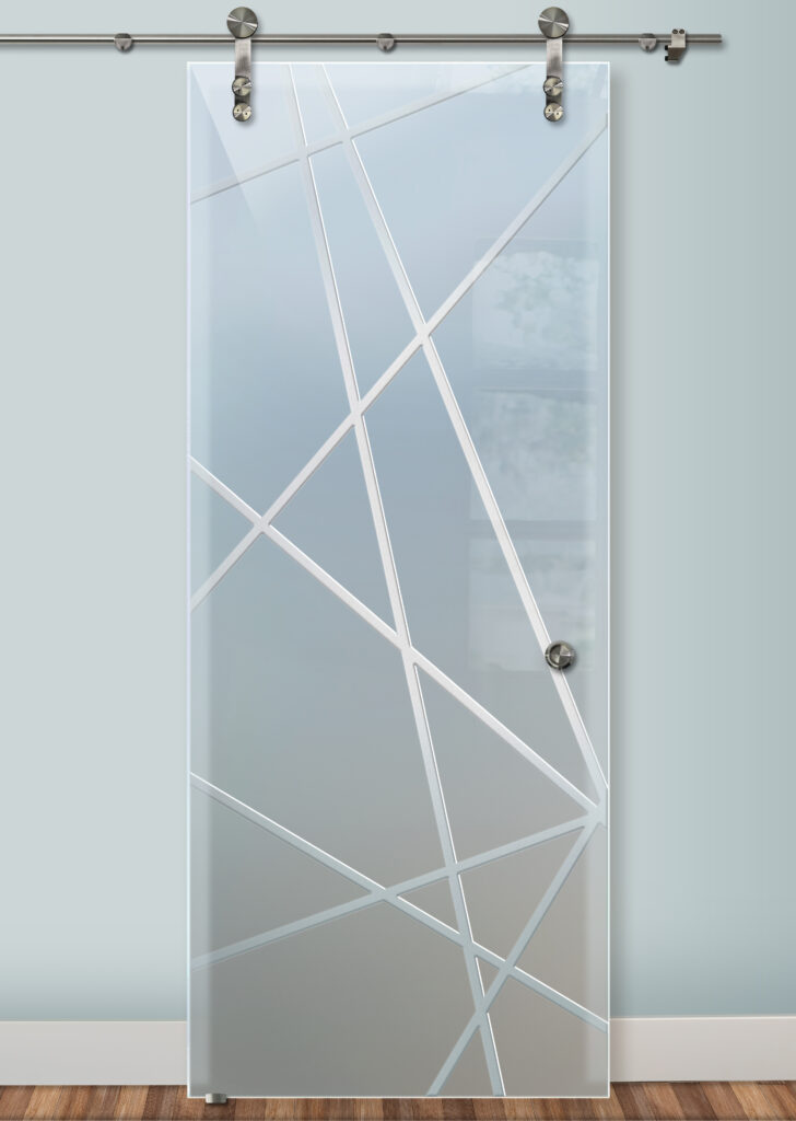 A modern glass barn door crafted by skilled artisans.