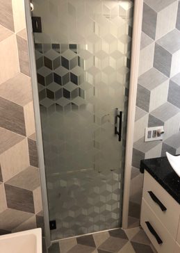 Art Glass Shower Door Featuring Sandblast Frosted Glass by Sans Soucie for Semi-Private with Geometric Illusion Cubes Design