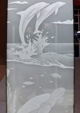 Window with a Frosted Glass Dolphins Leaping & Sea Turtle Oceanic Design for Private by Sans Soucie Art Glass