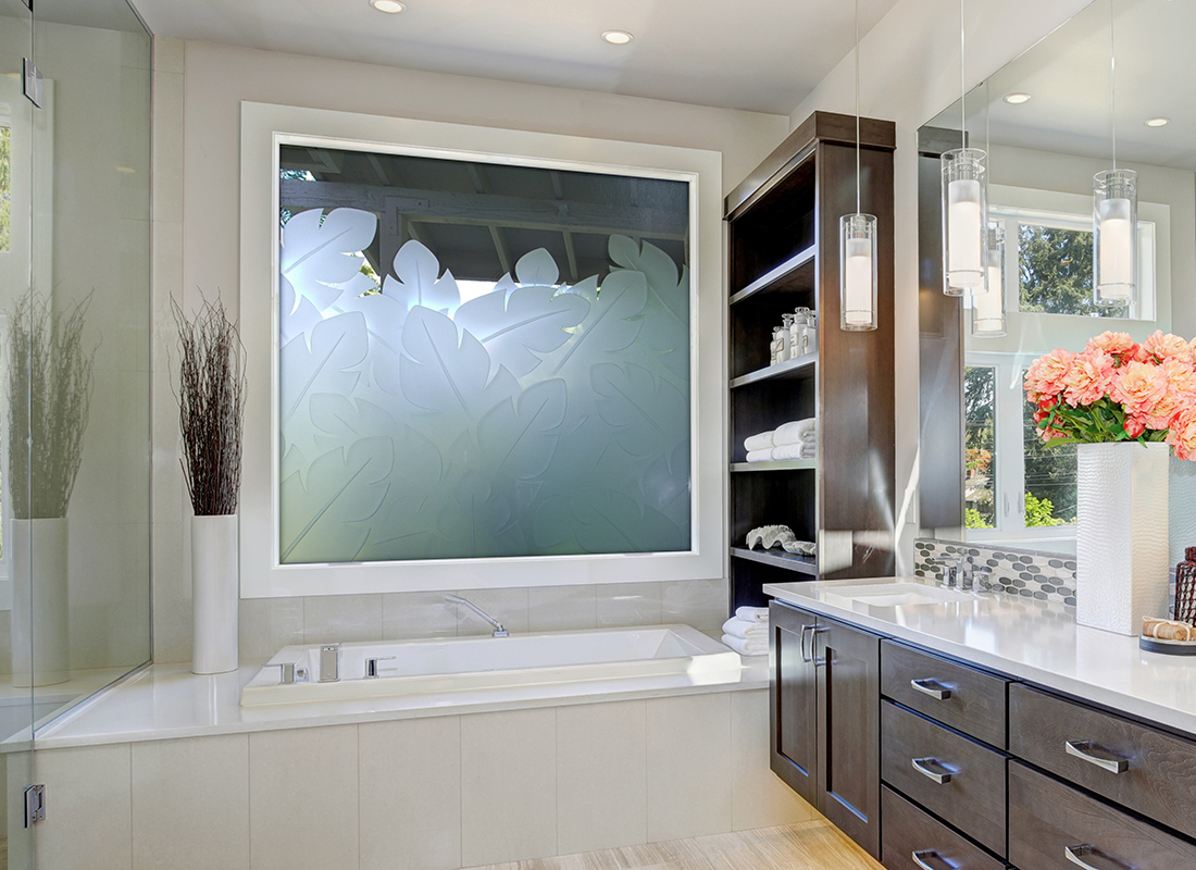 Decorative etched glass window for small bathrooms, offering upgraded design.