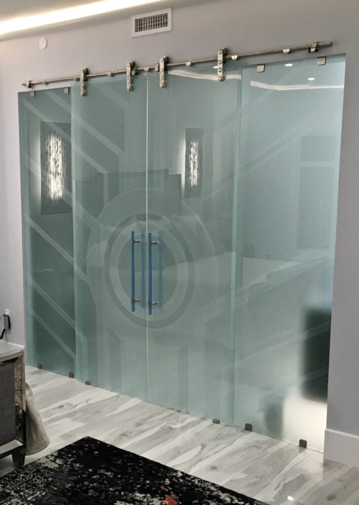 Sliding Etched Glass Barn Doors. Featuring double Frosted Glass Doors.