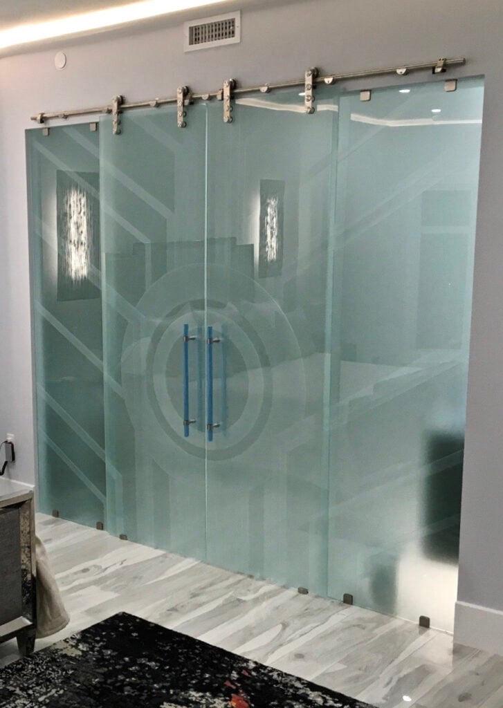 Sliding Etched Glass Barn Doors. Featuring double Frosted Glass Doors.