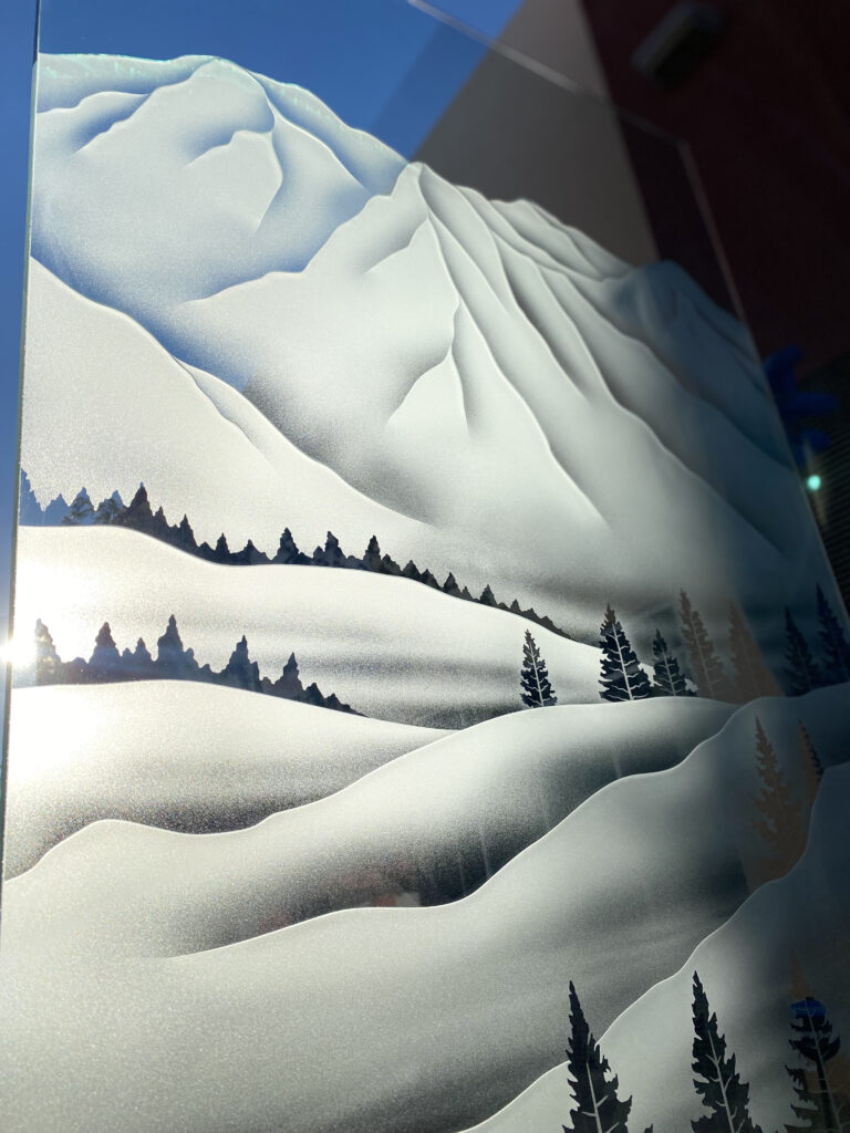 Close-up of Pine Falls glass partition panel design