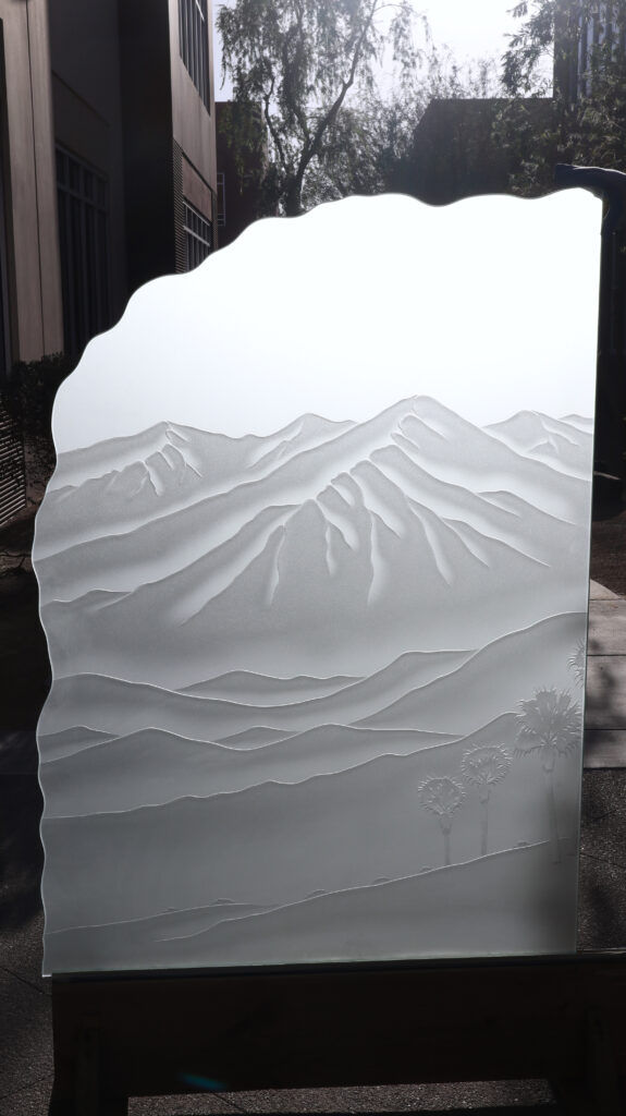 Etched glass panel with custom shape and irregular edges