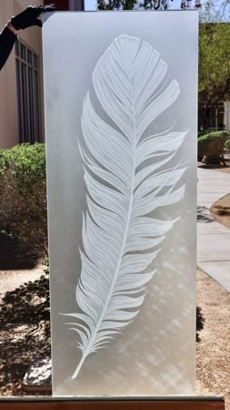 Partition featuring a Frosted Glass Foliage Design Sandblast Etched Glass Feather Design by Sans Soucie