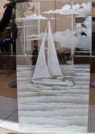 Partition featuring a Frosted Glass Oceanic Design Sandblast Etched Glass Setting Sail Design by Sans Soucie