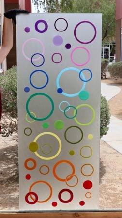 Partition showcasing a Frosted Glass Geometric Design with Sandblast Etched Glass Art by Sans Soucie Circularity Design