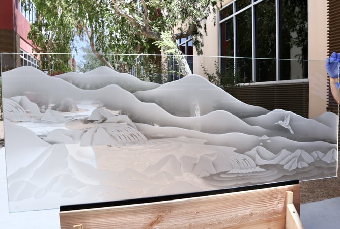 Partition showcasing a Frosted Glass Landscapes Design with Sandblast Etched Glass Art by Sans Soucie Falls Design