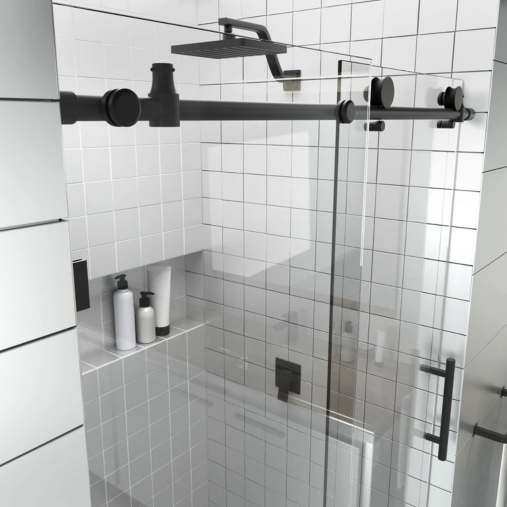 Modern matte black sliding shower door with exposed rail hardware in white tile bathroom