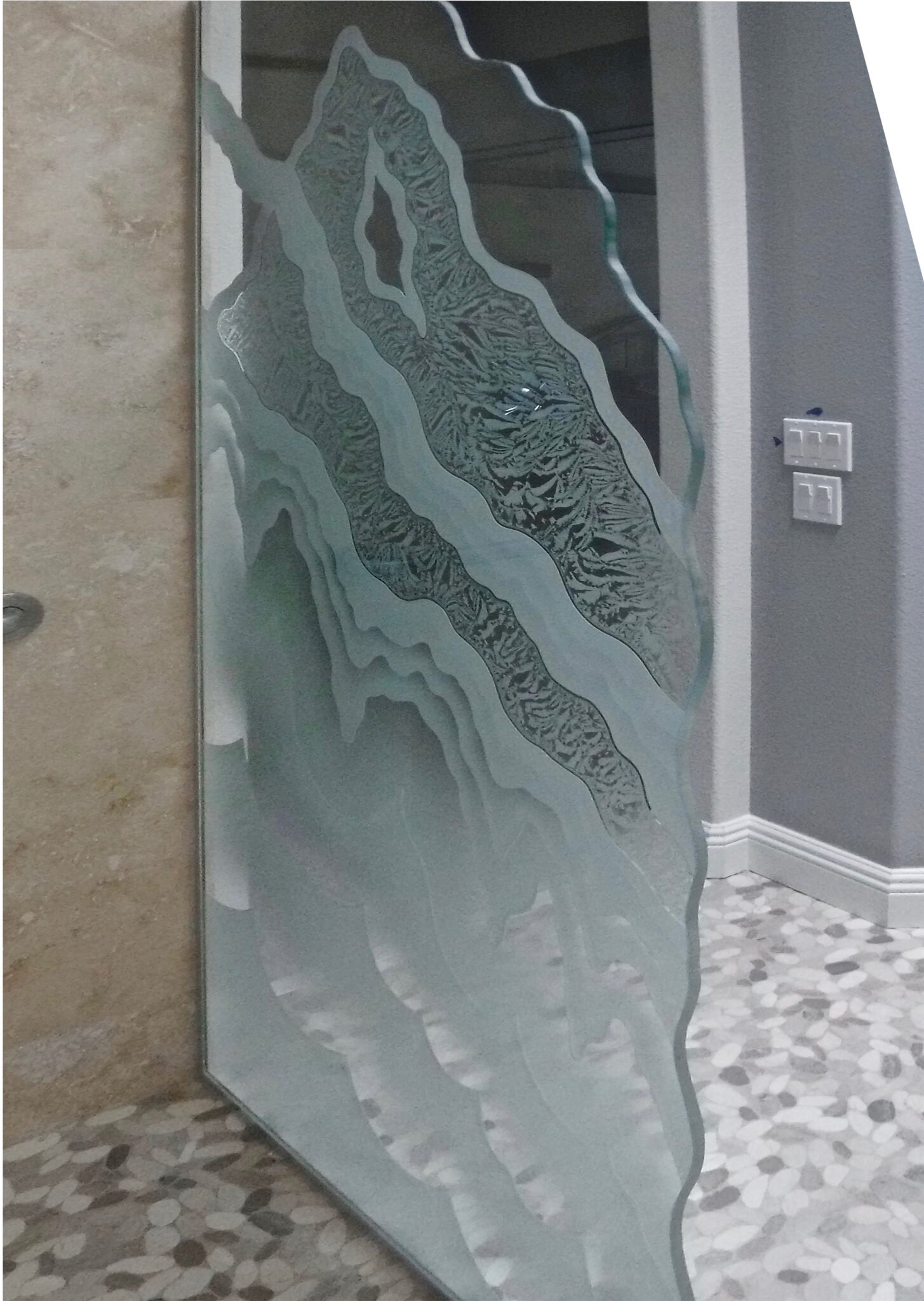 Frosted glass shower panel with abstract layered design and chiseled edge – industrial modern style by Sans Soucie Art Glass