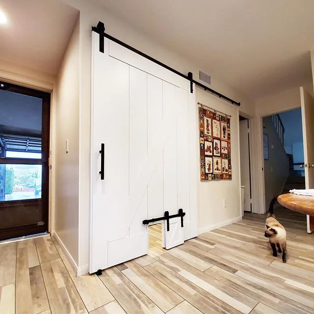 modern farmhouse sliding barn door with pet door option 