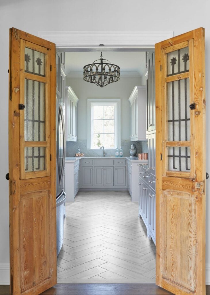 Spanish style antique pantry doors with glass and wrought iron 