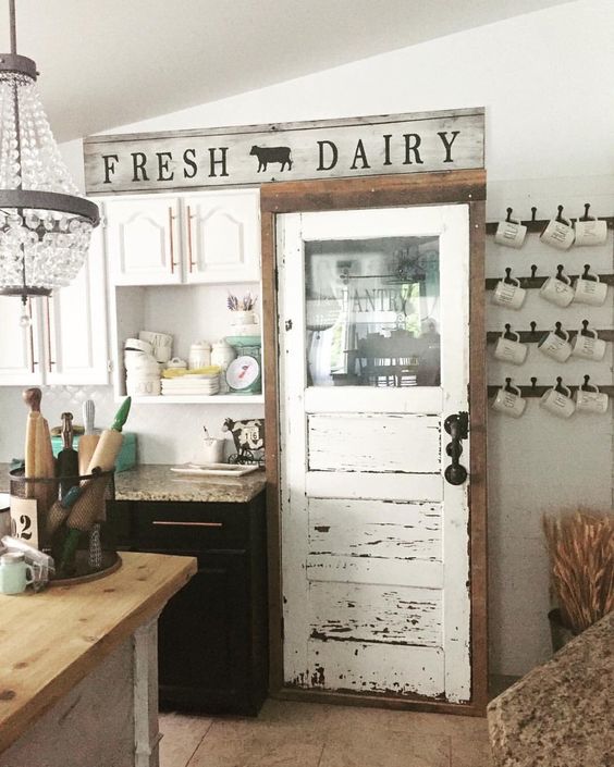 rustic farmhouse style white antique pantry door with glass 