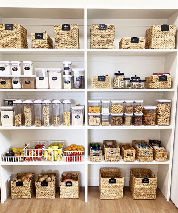 well-organized pantry with acrylic organizers woven baskets and wire baskets 