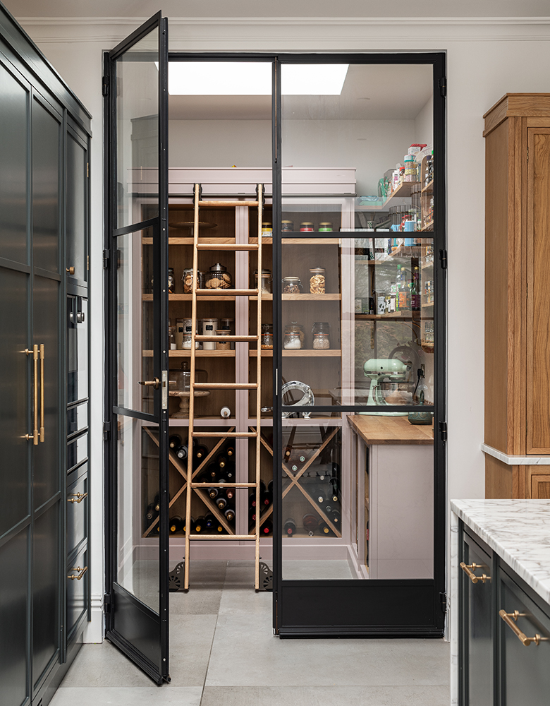 Combining Functionality and Aesthetics in Pantry Cabinet Designs double French pantry doors with glass acrylic containers with wine racks