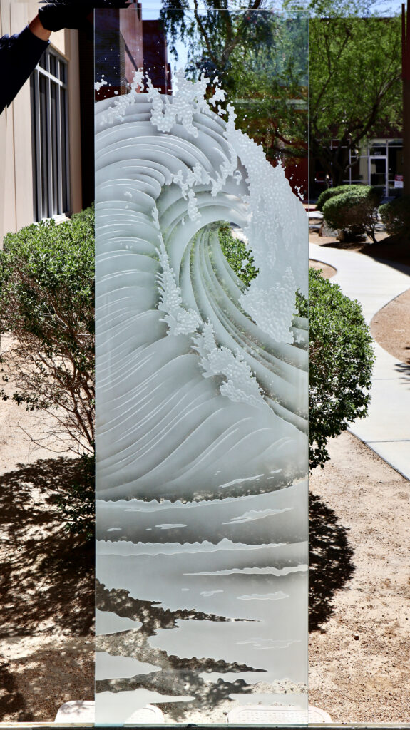 Ocean wave glass partition panel featuring a dramatic 3D Enhanced carved wave design with sculpted frosted glass layers and textured sea foam details.