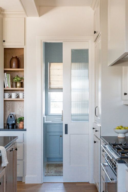 traditional design style white sliding pantry doors with glass sliding pocket door for kitchen