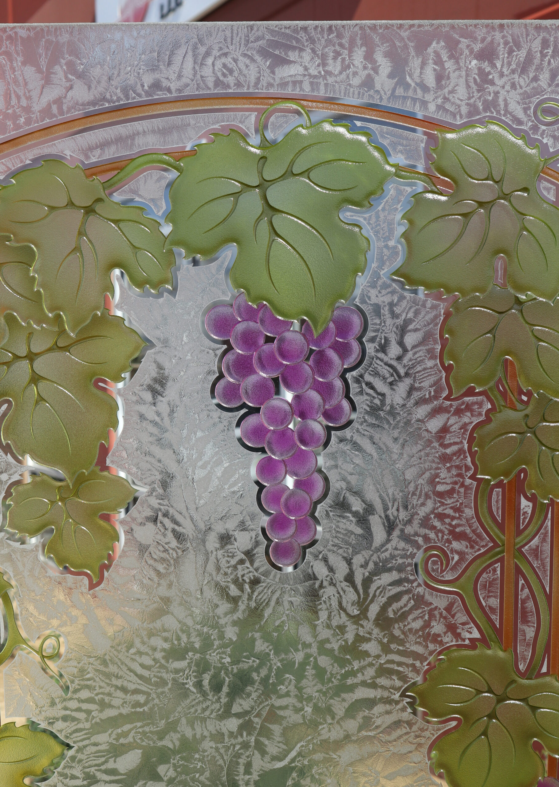 Arched grapevine design with 3D grapes and leaves on gluechip frosted glass panel.