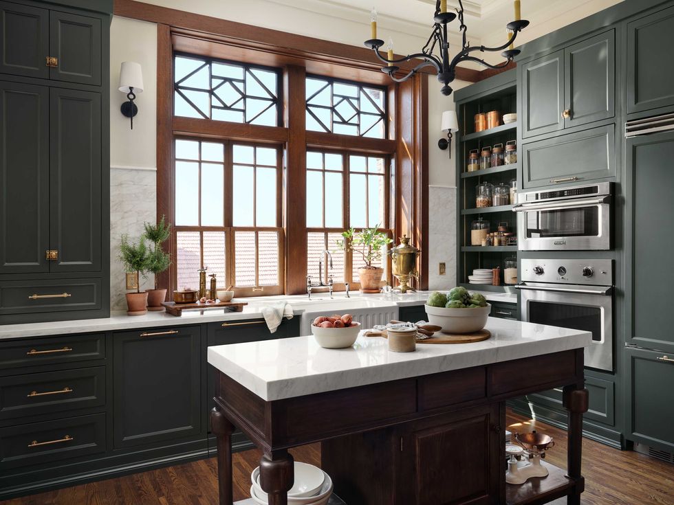 vertical floor to ceiling cabinets for butlers pantry dark green forrest green cabinetry craftsman design style 