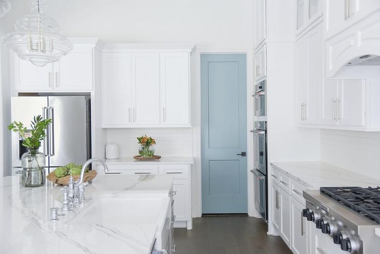 Sky Blue Wood Pantry Door Traditional Contemporary style in all white kitchen