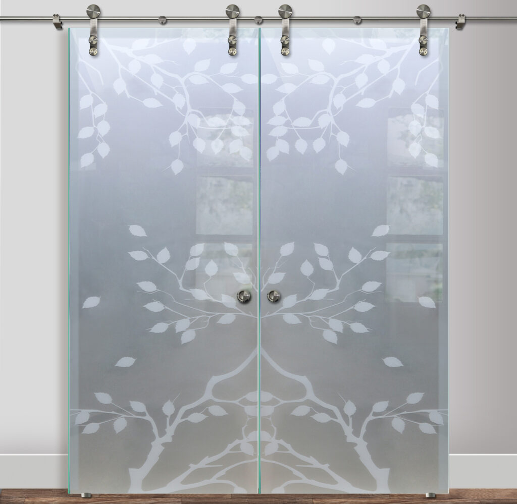 Double Frosted Glass Barn Door with etched cherry tree branches in a soft, minimalist style.
