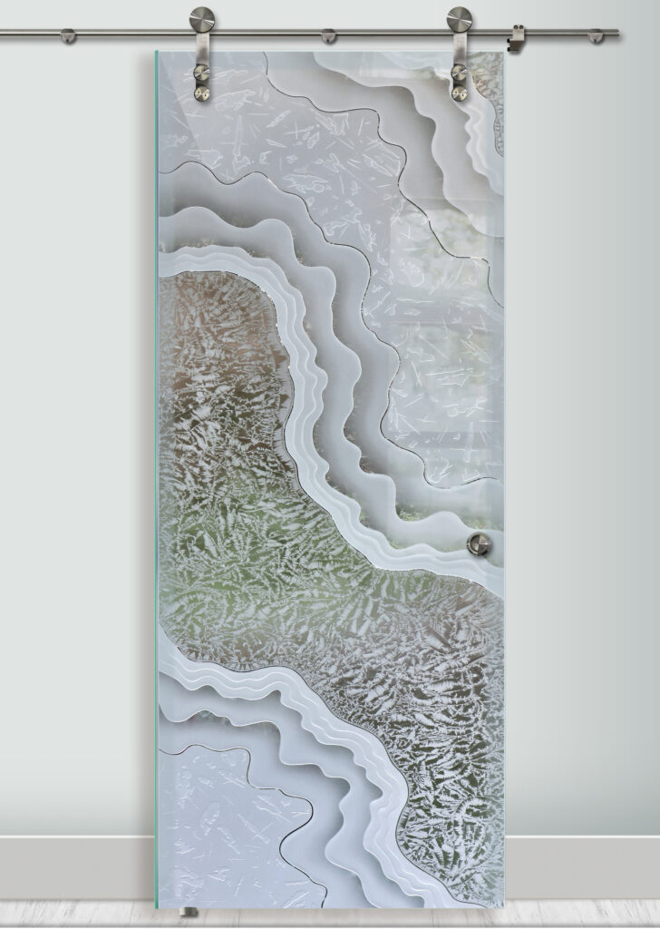 Best glass barn doors for master bathroom with a single sliding panel showcasing carved contour lines and gluechip texture, offering semi-privacy with artistic impact.