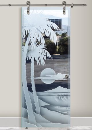 Glass Barn Door showcasing a Frosted Glass Palm Trees Design with Sandblast Etched Glass Art by Sans Soucie Palm Sunset Waves Design