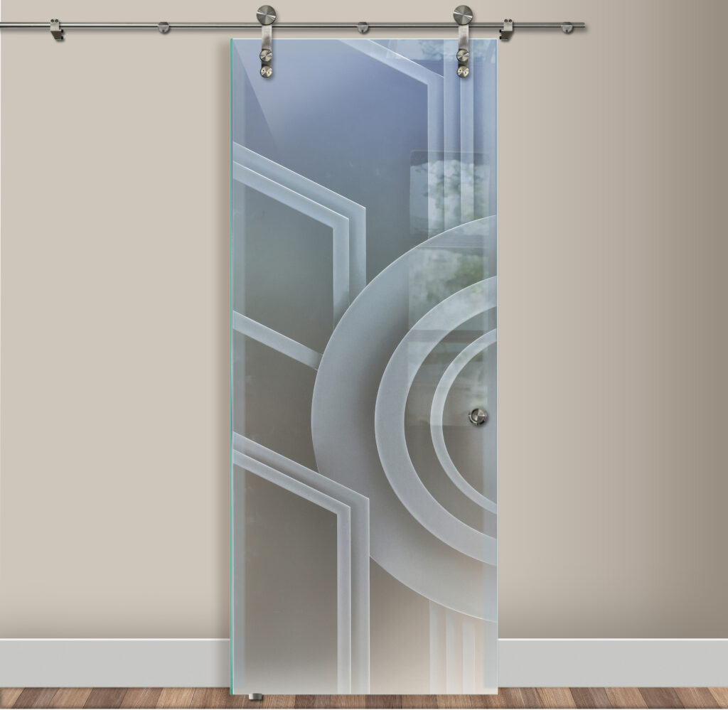 Modern barn style door with carved glass geometric pattern and stainless hardware