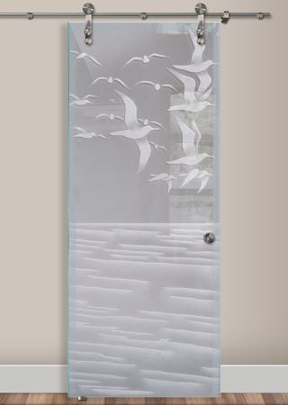 Glass Barn Door showcasing a Frosted Glass Oceanic Design with Sandblast Etched Glass Art by Sans Soucie Swallows Design