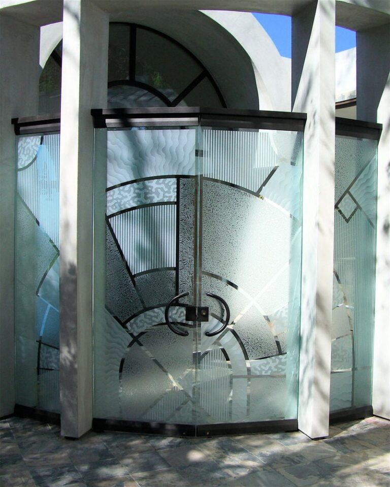 Secure Frameless Glass Doors with tempered glass. High-end full glass exterior door backed by expert craftsmanship of Sans Soucie Art Glass.